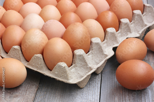 fresh chicken brown eggs in packing. 