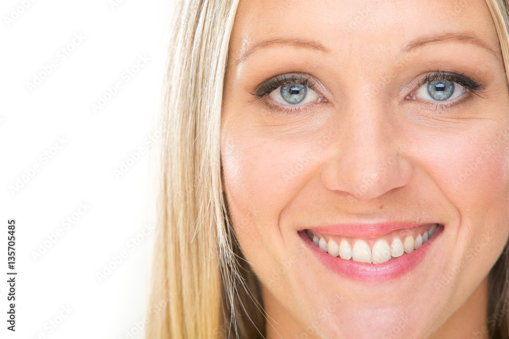blonde smiling young woman face isolated on white blonde smiling young woman face isolated on white