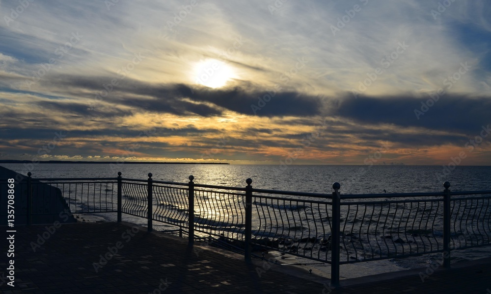 Fototapeta premium Sea, sunset, clouds, blue, loneliness, emptiness.