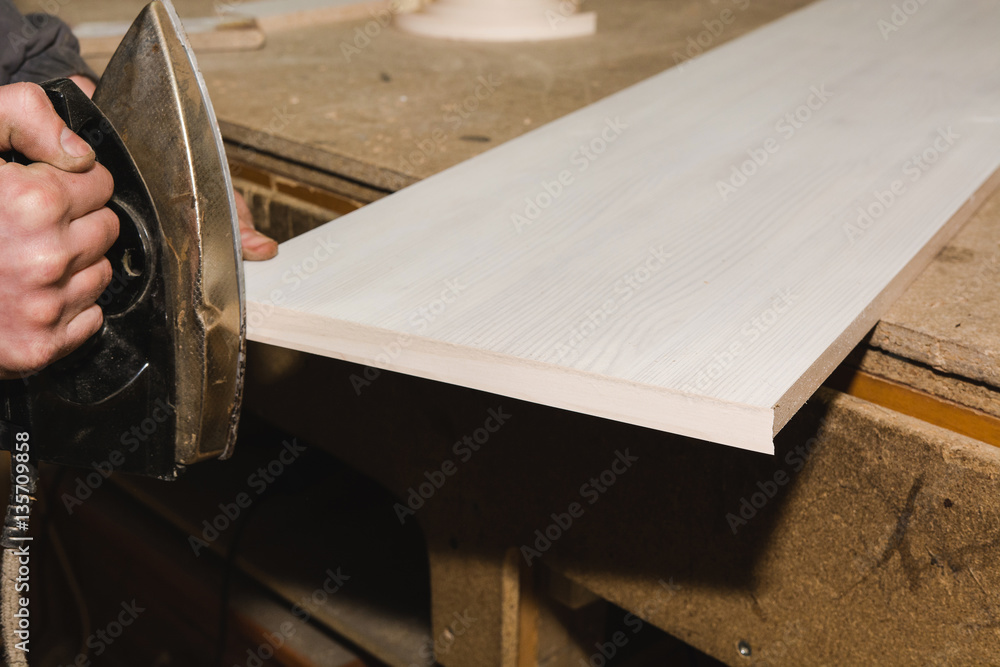Processing of a wood-shaving plate. Processing of a wood-shaving plate.
