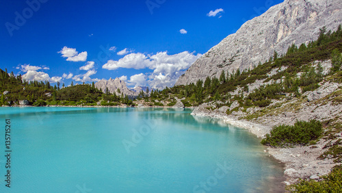 Amazing view of Sorapis lake with unusual color of water. Lake located in Dolomite Alps, Italy