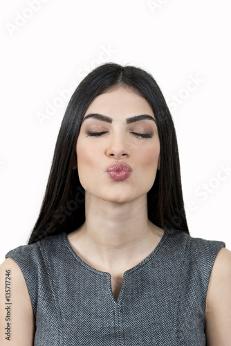 Woman kissing.