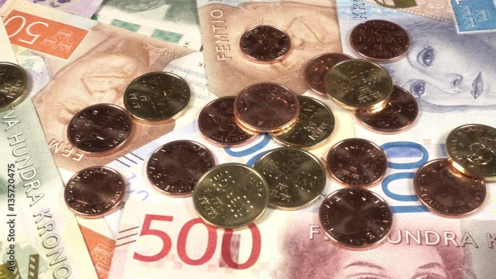 New swedish bills and coins. Introduced 2015 - 2016. Panning shot.