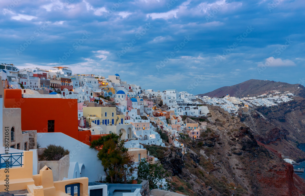 Fototapeta premium View of the village Oia on the sunset.
