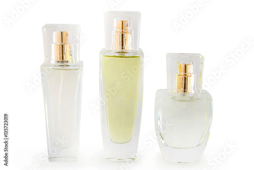 Three glass perfume bottle on white background