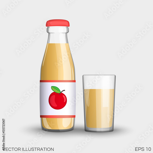 Apple juice in a transparent glass bottle isolated in cup