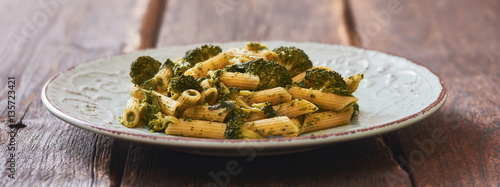 Pasta with broccoli on vintage dish - vegetarian food