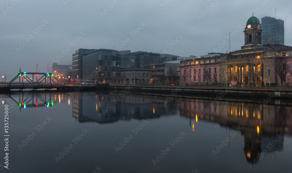 Cork city High tide river reflection during Foggy and cloudy winter evening