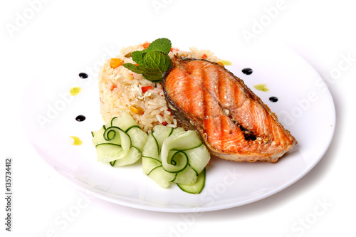 Fried salmon fish with a soaked rice