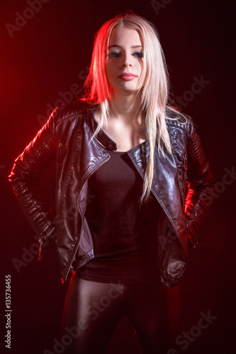 Woman in a black leather jacket