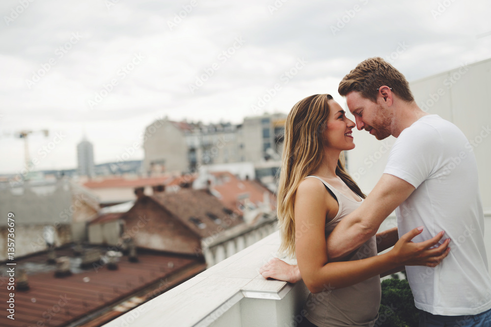 Romantic couple on rooftop