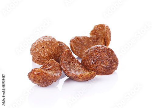 Bunch of chocolate cereals on white background