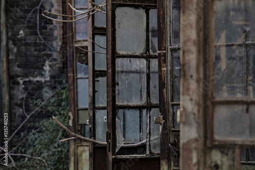 Rusty doors of an old, abandoned industrial facility