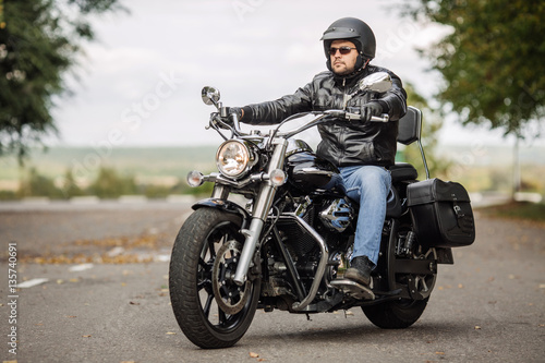 Biker man with motorcycle