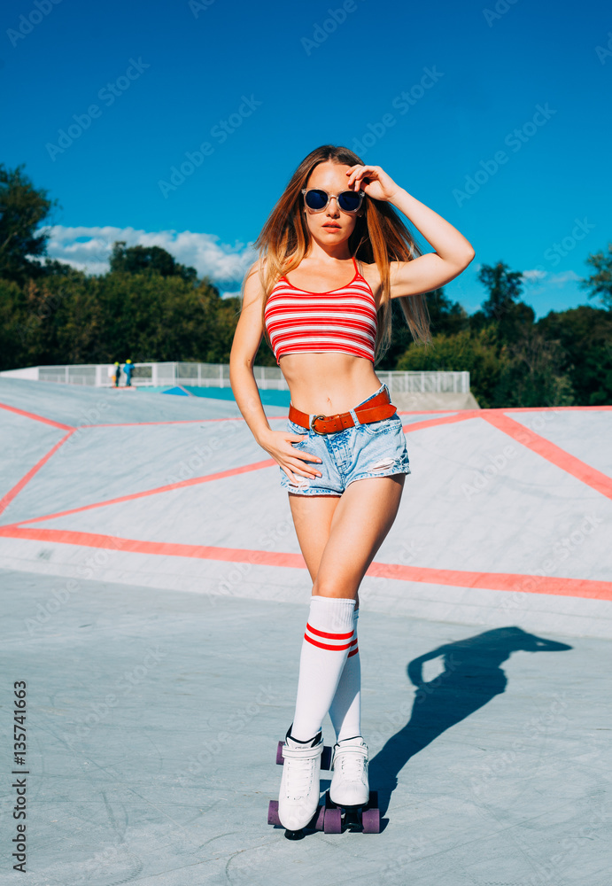 A Looker Leggy Long-haired Young Blonde Woman in a Vintage Roller Skates,  Sunglasses, T-shirt Shorts Sitting on Road. Eye-candy Yo Stock Photo -  Image of american, happy: 84896256