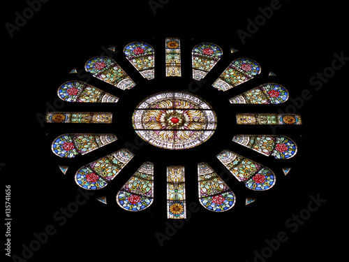 Gorgeous stained glass rose window in the Basilica of St. Nicholas, Amsterdam, The Netherlands 