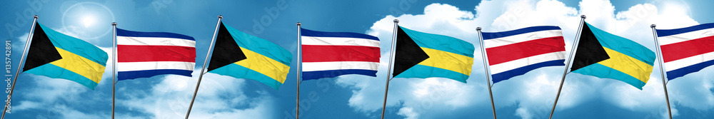 Bahamas flag with Costa Rica flag, 3D rendering Bahamas flag with Costa Rica flag, 3D rendering