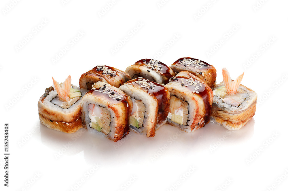 Japanese cuisine. Eel sushi roll isolated on white background. Japanese cuisine. Eel sushi roll isolated on white background.