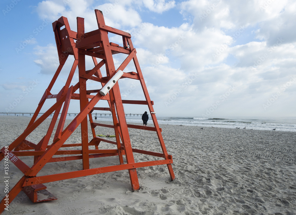 Red Life Guard Chair on Beach in Florida Red Life Guard Chair on Beach in Florida