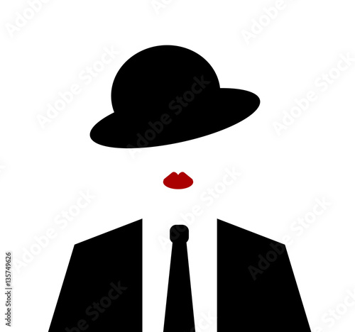 woman wearing suit and tie and hat