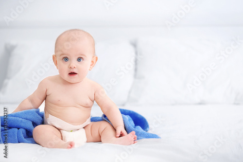 Cute funny baby with towel ...