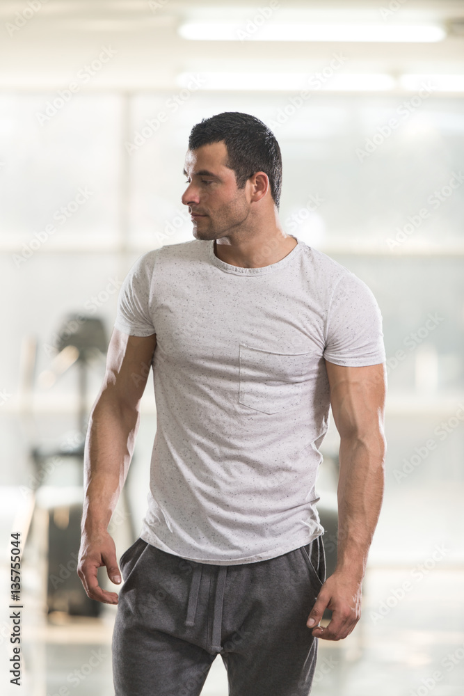 Portrait of Muscle Man in White T-shirt Portrait of Muscle Man in White T-shirt