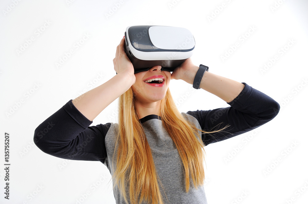 Young girl with glasses of virtual reality on a white background Young girl with glasses of virtual reality on a white background