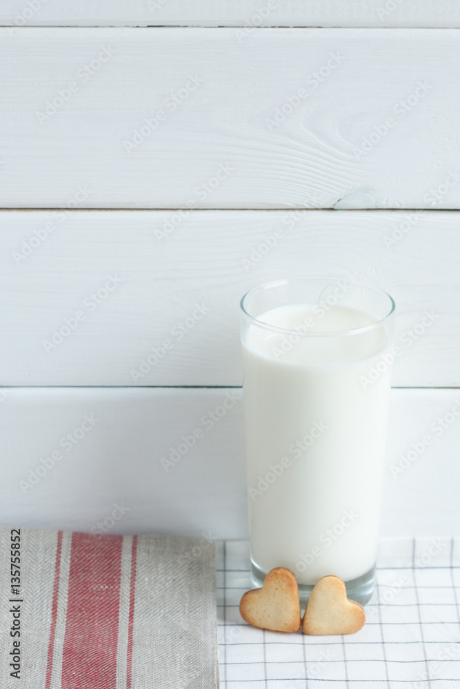 Cookies in the form of hearts with milk. Cookies in the form of hearts with milk.