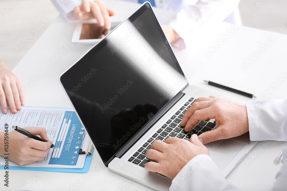 Fototapeta premium Doctors at work in clinic