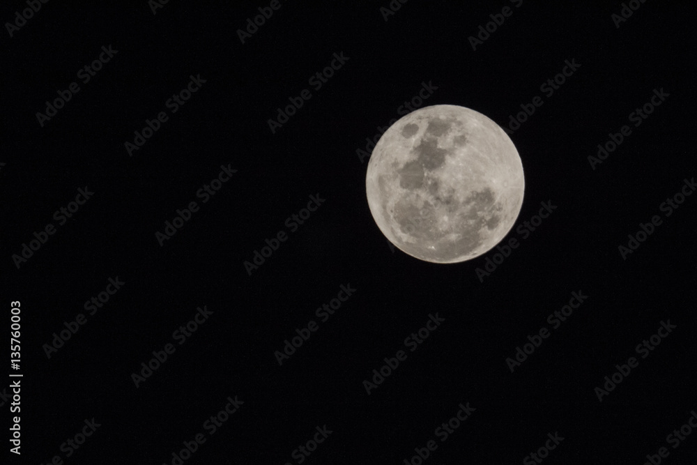 Fototapeta premium Blur moon with isolated black sky background for text adding