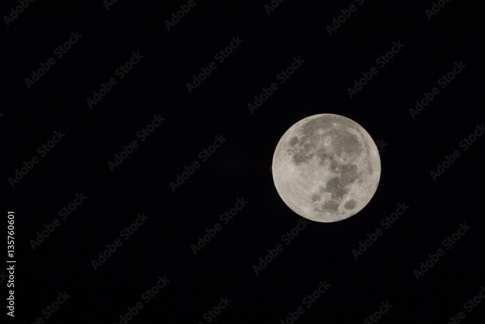 Blur moon with isolated black sky background for text adding