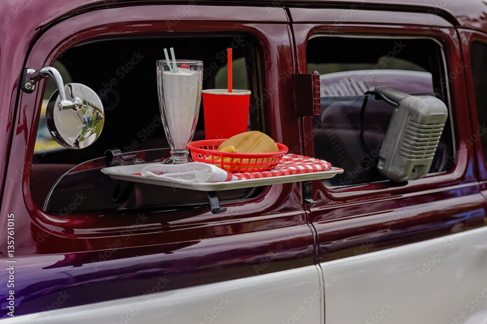 Drive in movie theater speaker and food tray on vehicle Stock Photo | Adobe  Stock