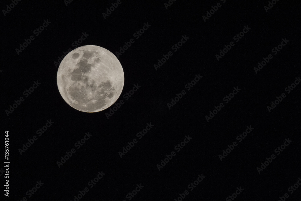 Naklejka premium Blur moon with isolated black sky background for text adding