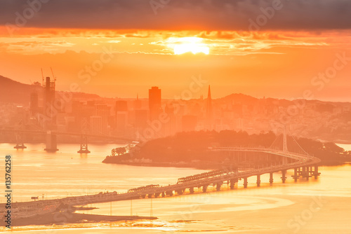 San Francisco skyline and Bay Bridge at sunset