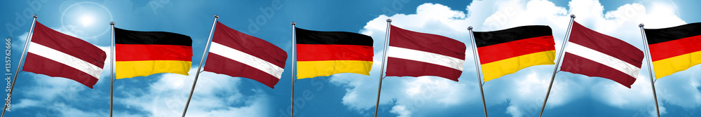 Latvia flag with Germany flag, 3D rendering Latvia flag with Germany flag, 3D rendering