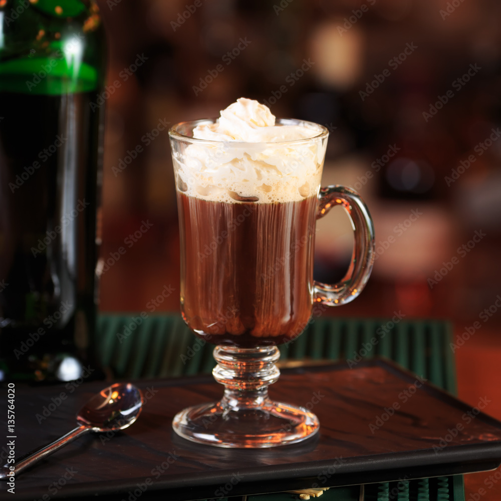 Irish coffee in a bar. Concept of St Patrick holiday. Holiday ba Irish coffee in a bar. Concept of St Patrick holiday. Holiday ba