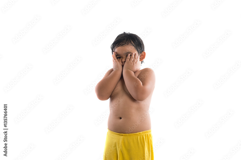 Cute little boy standing and looking at camera, enjoy playing. Cute little boy standing and looking at camera, enjoy playing.