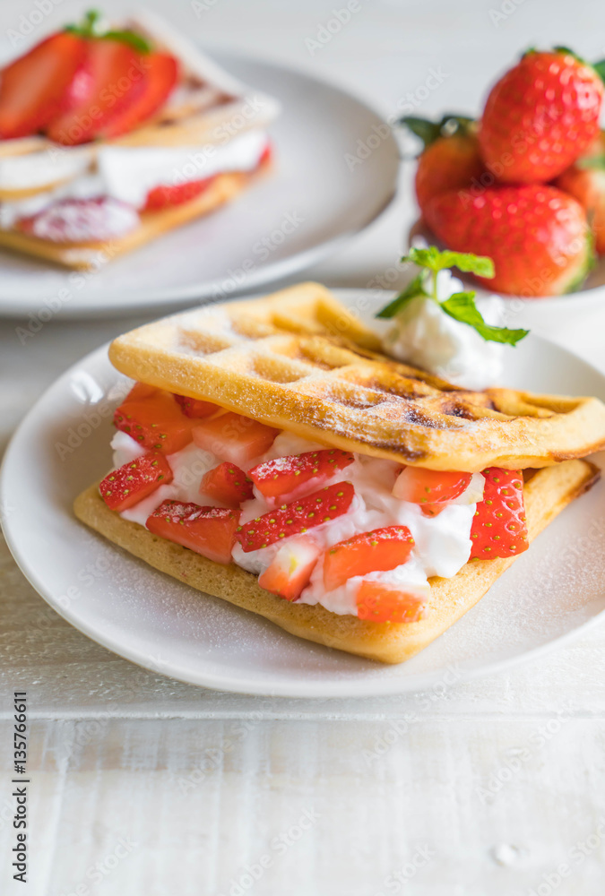 waffle with strawberry on wood