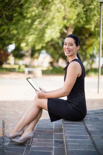 Happy businesswoman holding digital tablet © WavebreakMediaMicro