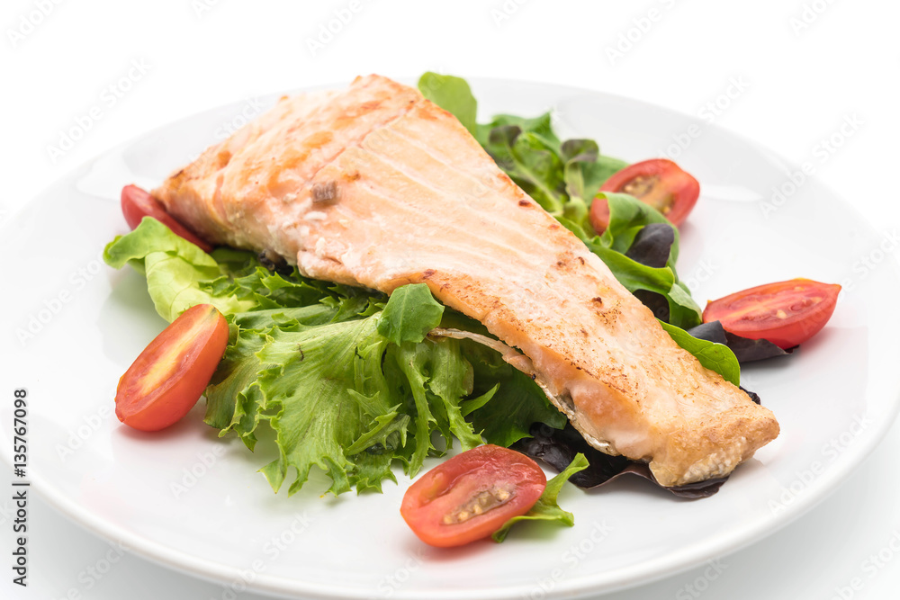 grilled salmon steak on white