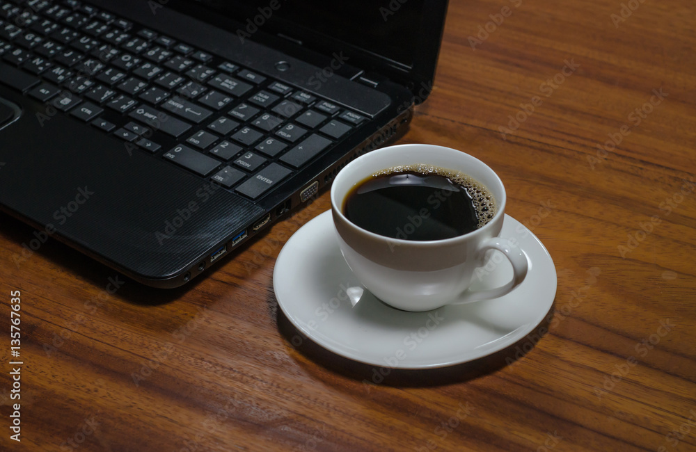 Black coffee on the wooden table Black coffee on the wooden table