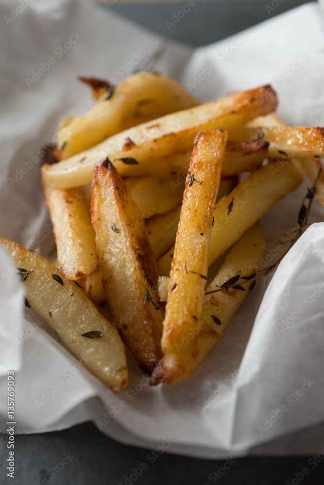 Closeup of Baked Fries on Paper Closeup of Baked Fries on Paper