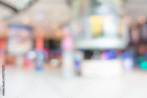 Abstract blur people in shopping center . © jannoon028