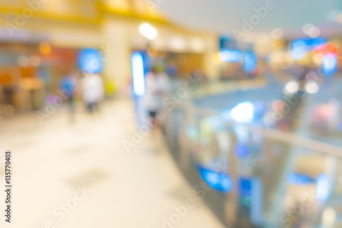 Abstract blur people in shopping center . © jannoon028