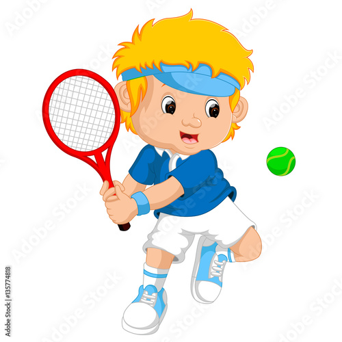 Young boy playing tennis with a racket