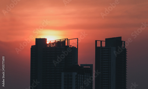 Silhouette building with sunset