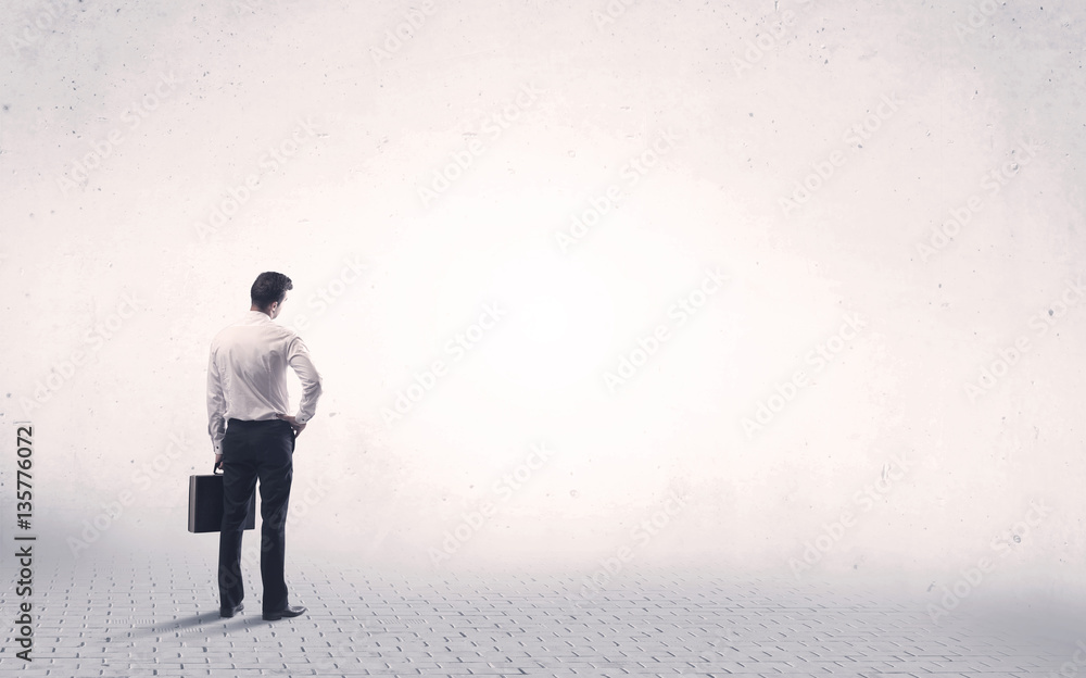 Elegant person standing with his back Elegant person standing with his back