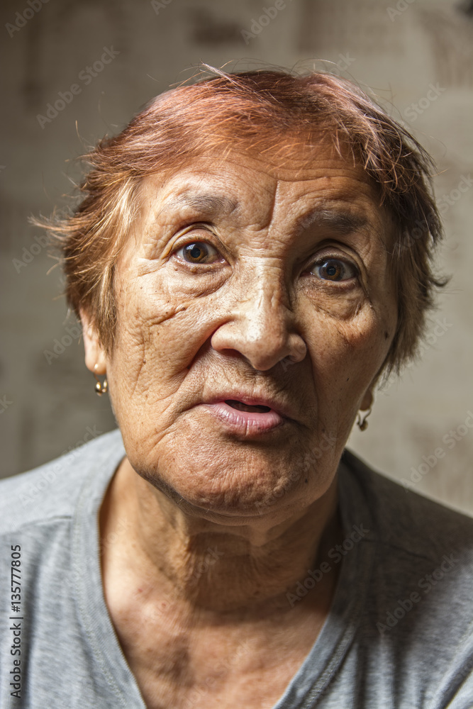 portrait of a pensive elderly woman 