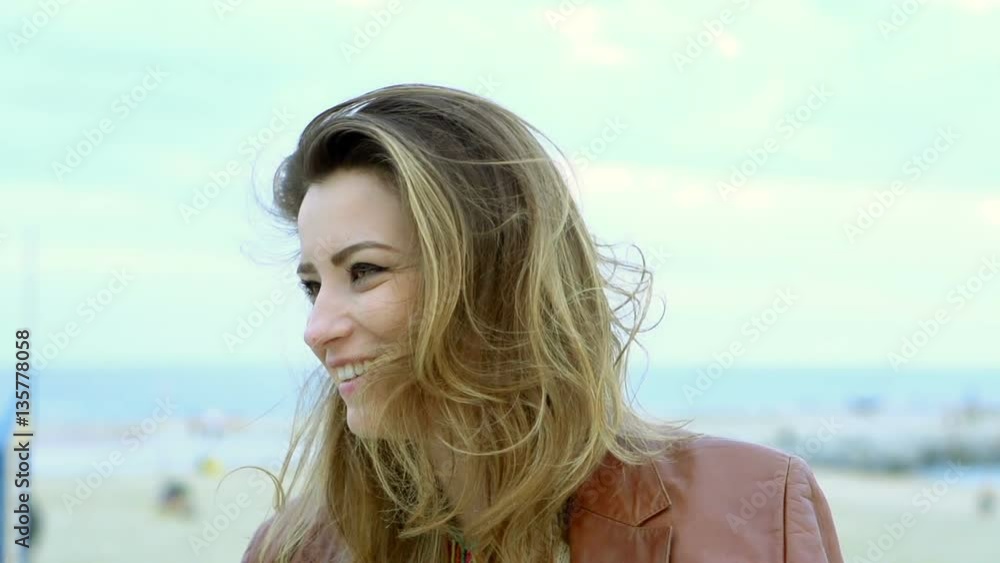 Beautiful woman sitting at the sea and chatting, steadycam shot, slow motion shot at 240fps
Beautiful woman sitting at the sea and chatting, steadycam shot, slow motion shot at 240fps