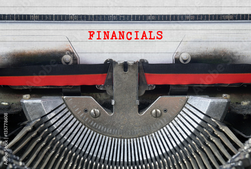 FINANCIALS Typed Words On a Vintage Typewriter Conceptual
